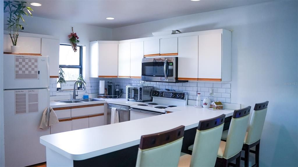 breakfast nook and kitchen view