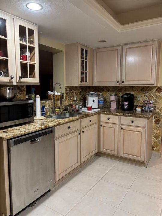 Current Kitchen with Opening to Family Room.