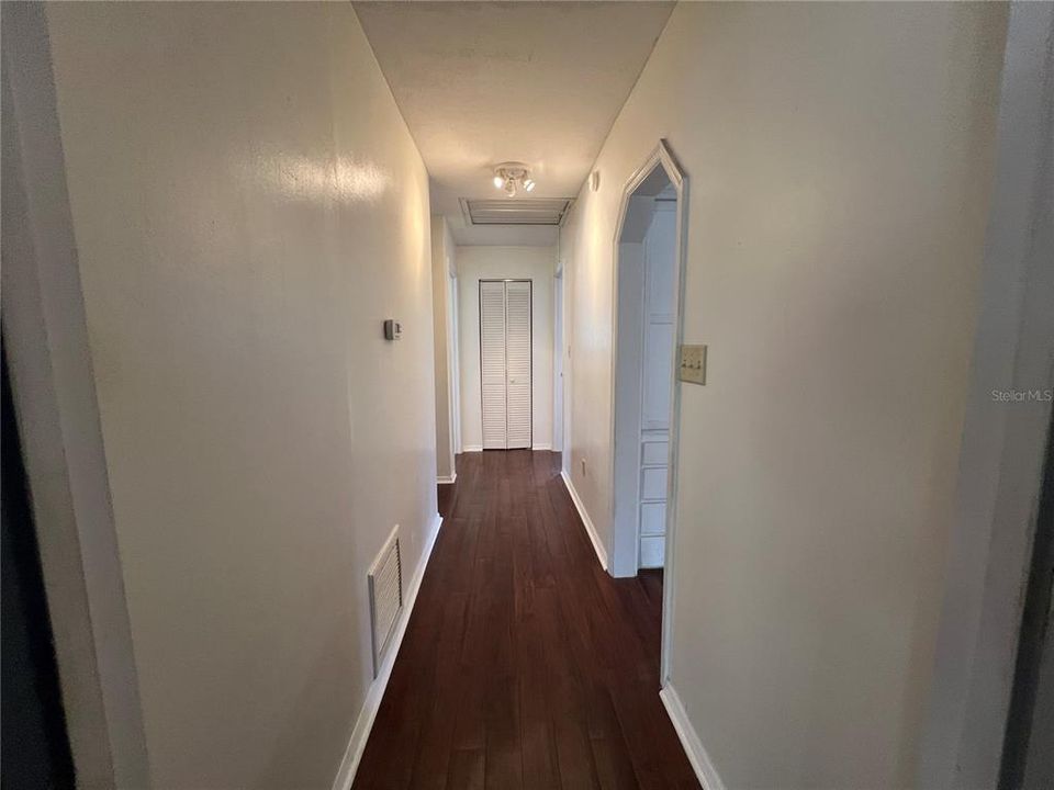 HALLWAY TO ADDITIONAL BEDROOMS