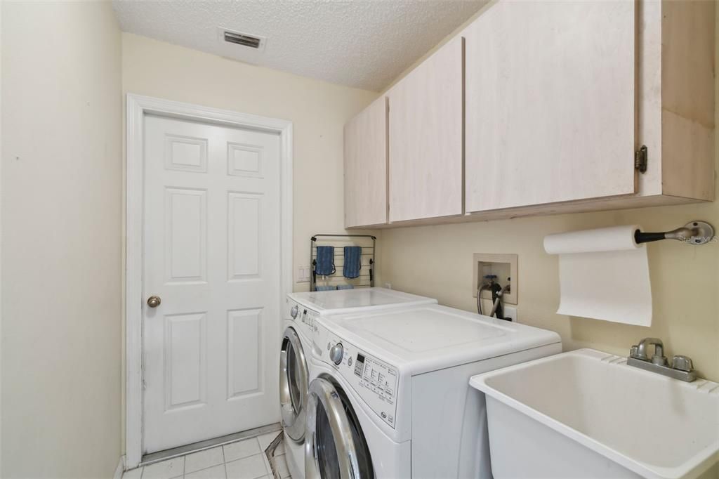 Laundry Room, near primary suit & garage