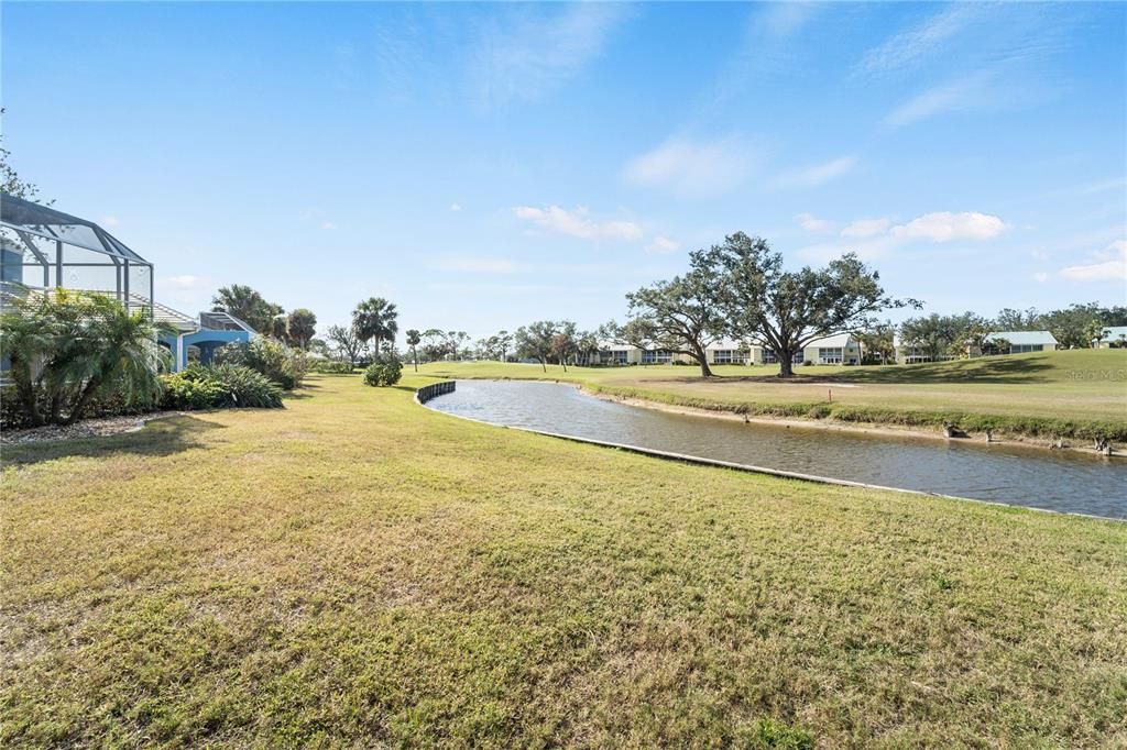 Backyward with pond and golf course views