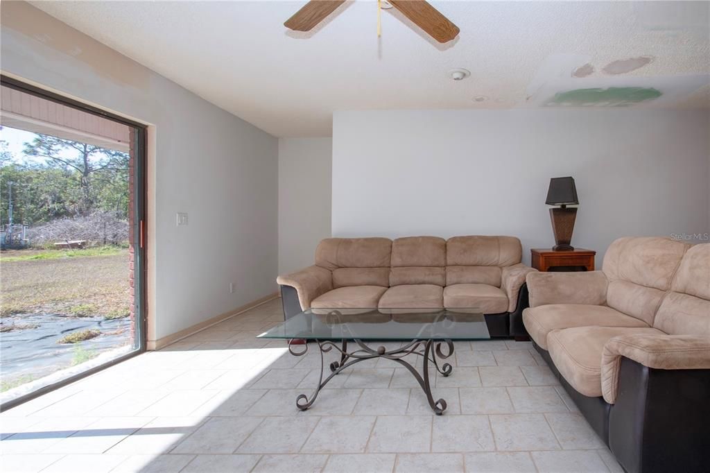 Living room looking out sliding glass doors