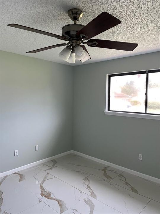 Master bedroom with upgraded tile