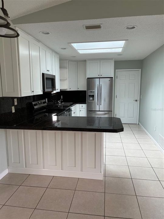 Granite Counter tops with bar area