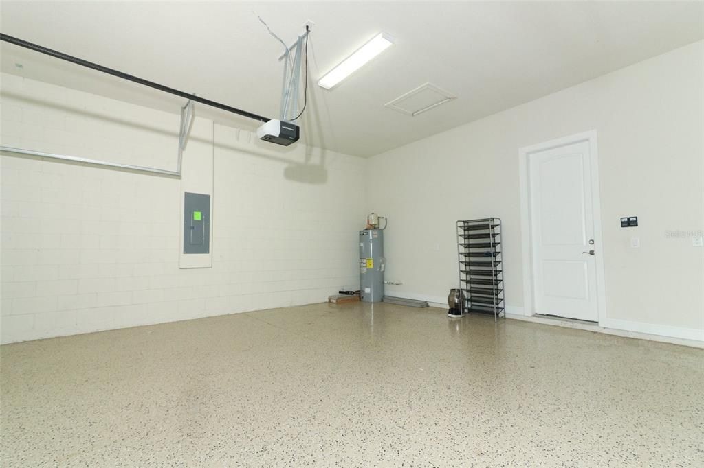 3-car garage with painted floor.