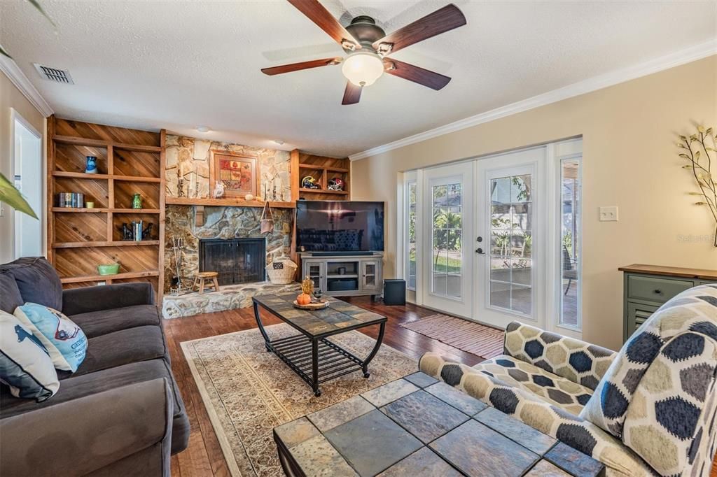 Family room with wood burning fireplace