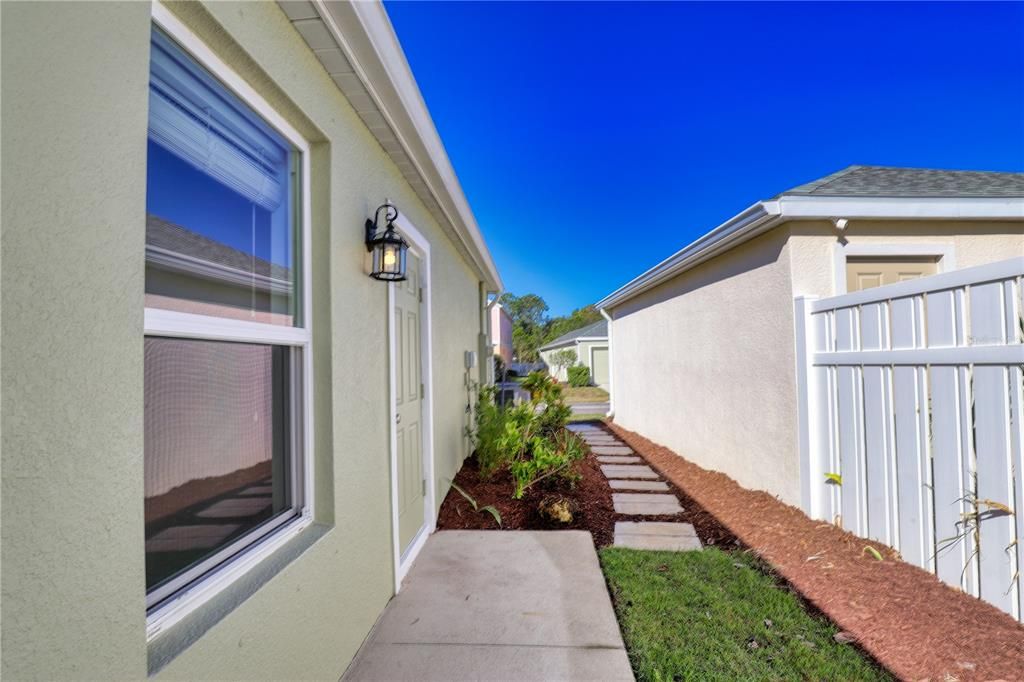 Outer walkway looking towards back of home