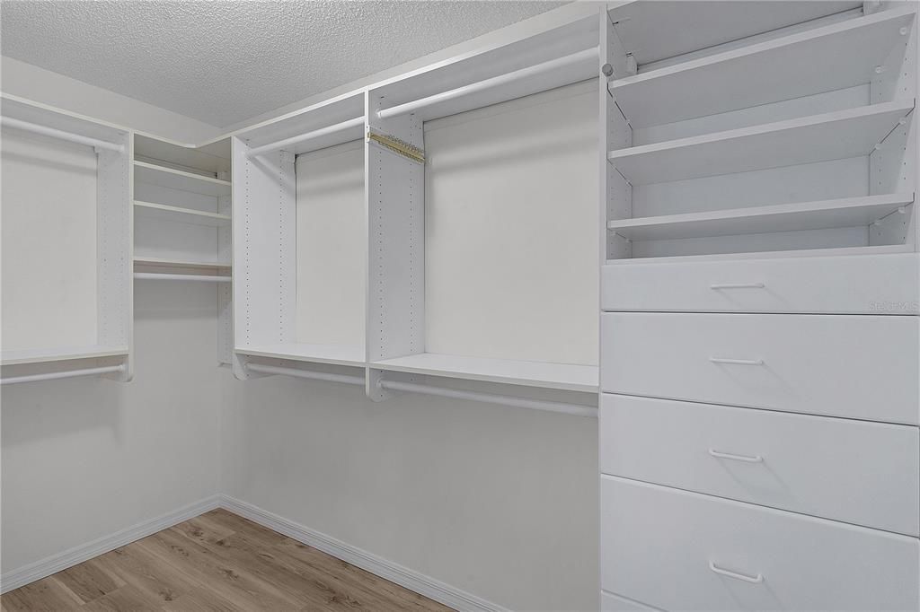 Primary Bedroom Walk in closet