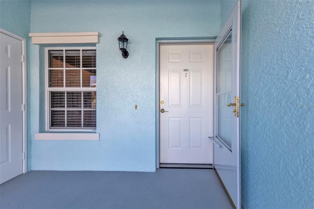 Front entry with storm door