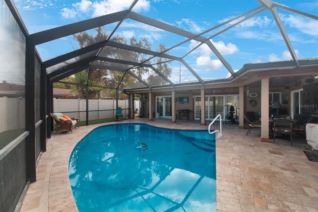 Large private pool with covered entertainment space.