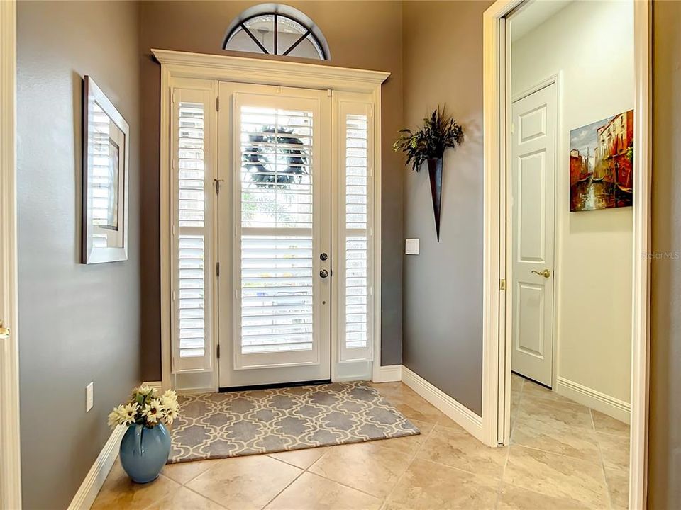 Front door and hall to 2nd bedroom and bathroom