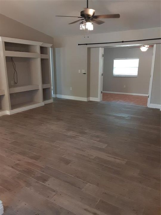 large living room with built in entertainment center