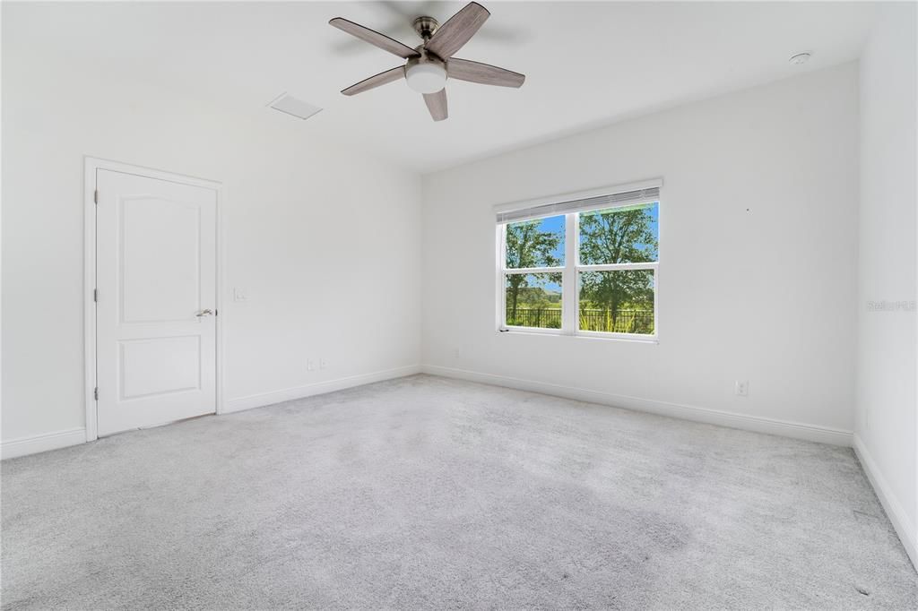 Carpeted floor and 2 walk in closets