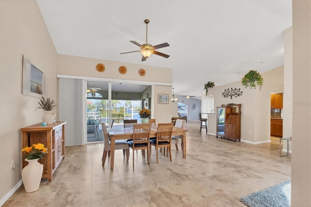 Seamlessly Connected Dining and Family Room, Offering a Versatile Space for Gathering and Entertaining