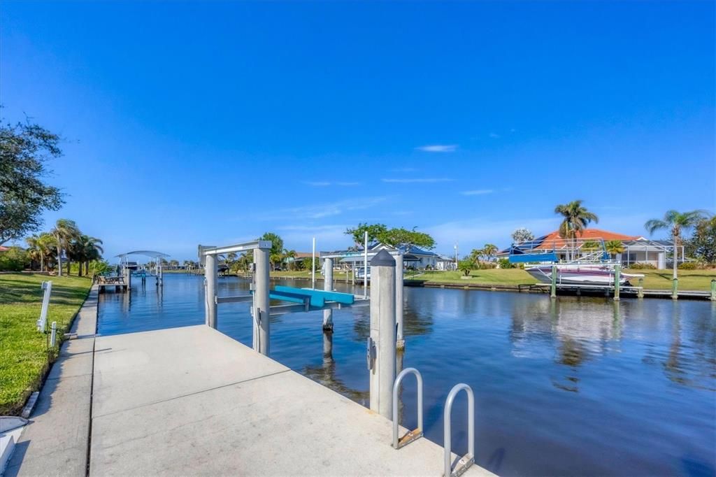 Durable 30' by 7' concrete dock, offering plenty of space for boats