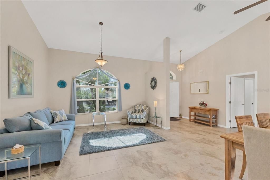 High Ceilings in Open Family Room Dinning Room Combo