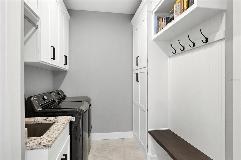 Upgraded Indoor Laundry Room Offers Plenty of Storage Space