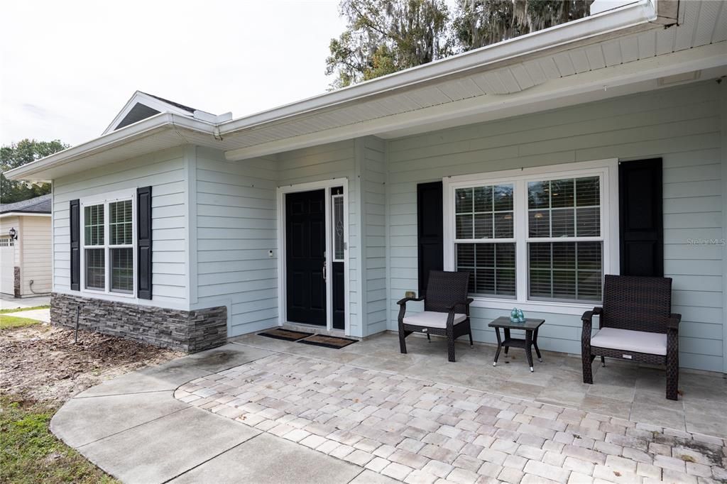 Front covered porch and paver patio