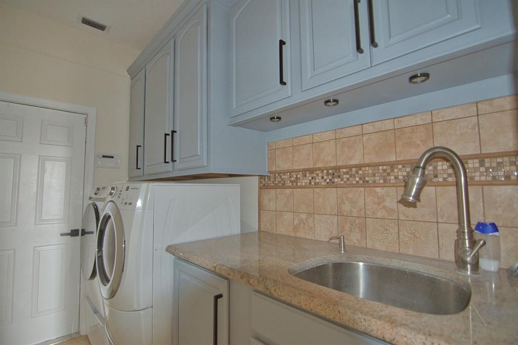 Laundry room with sink