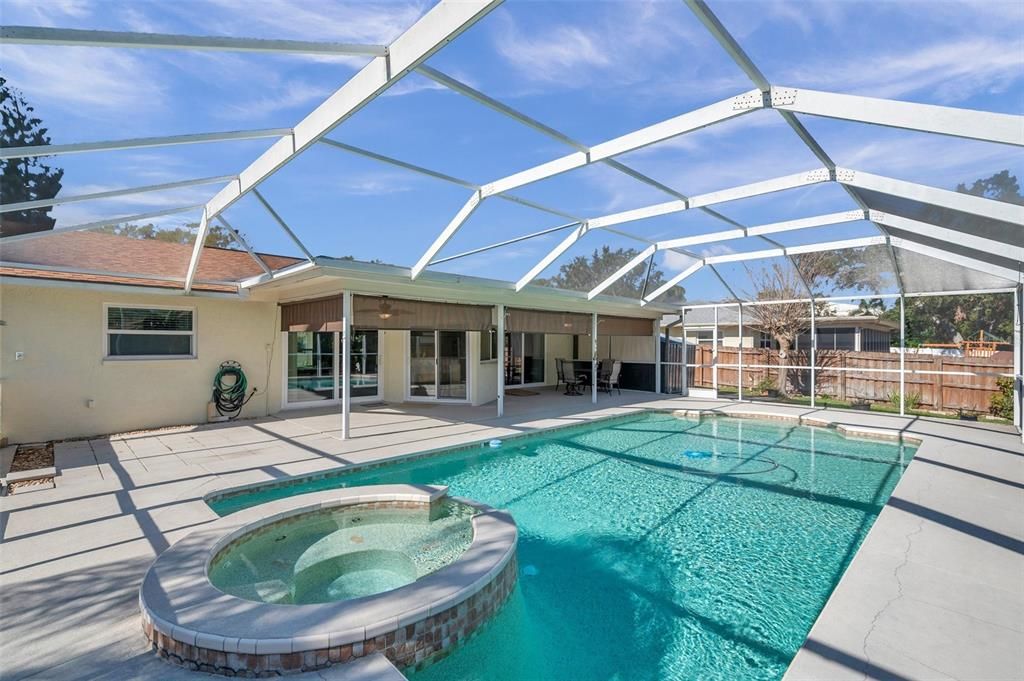 View of three sets of sliders for pool access