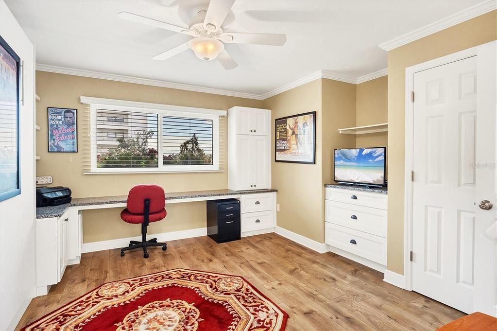 Second bedroom - wall closet with built-in dresser and desk