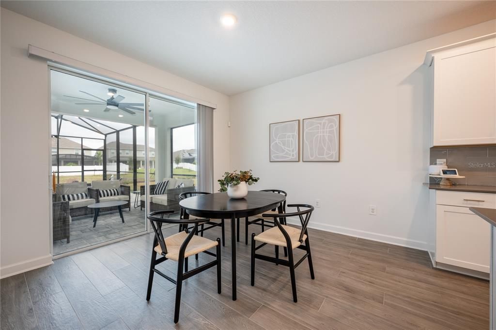 Breakfast nook with view of pool