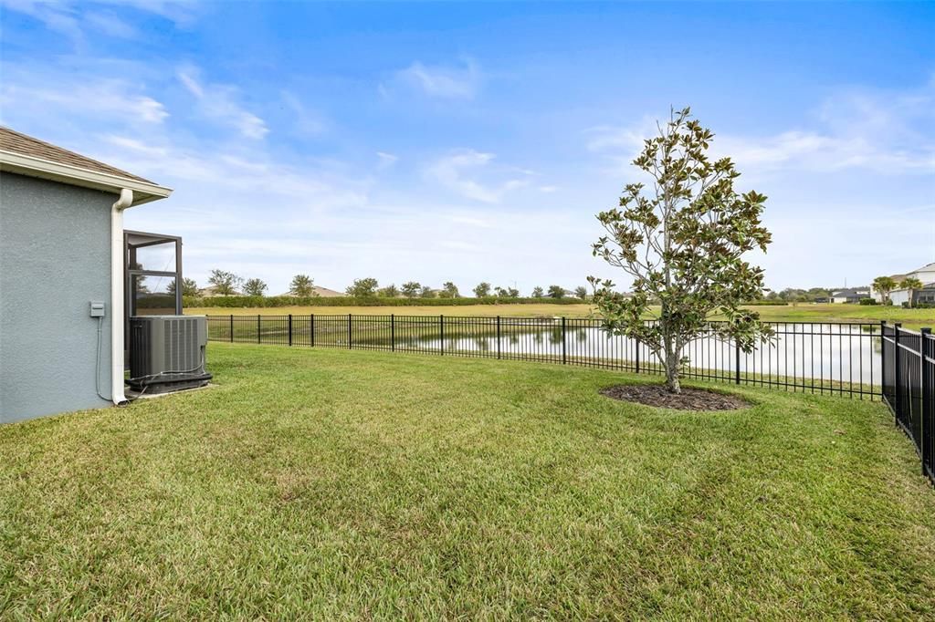 There is so much additional room in the fenced in yard with no view obstructions in the aluminum fencing.