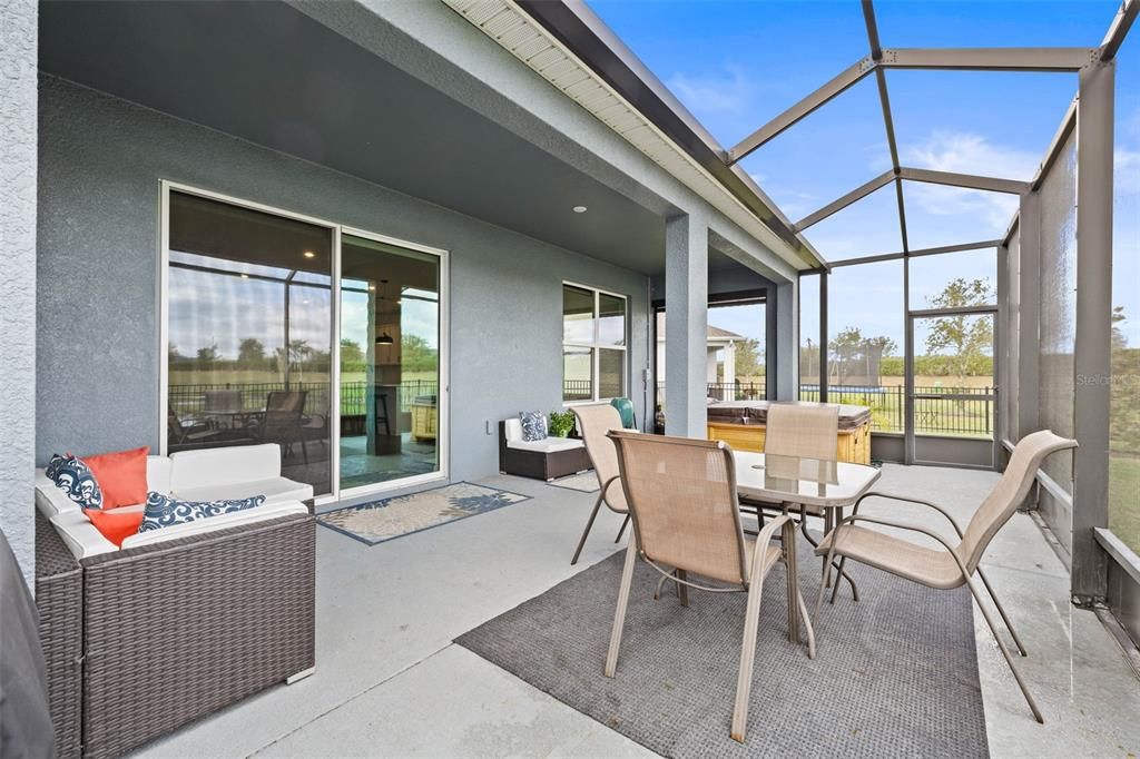 This amazing outdoor space has a screened lanai perfect for entertaining!