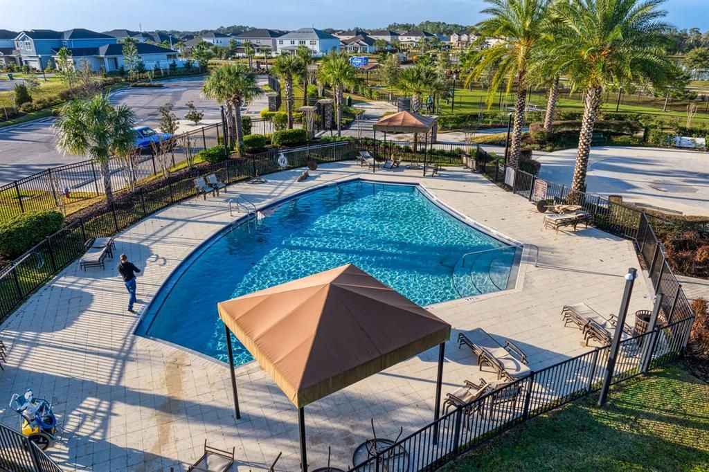 The pool at Promenade is 3ft-6ft with lounge chairs and a fenced in area.