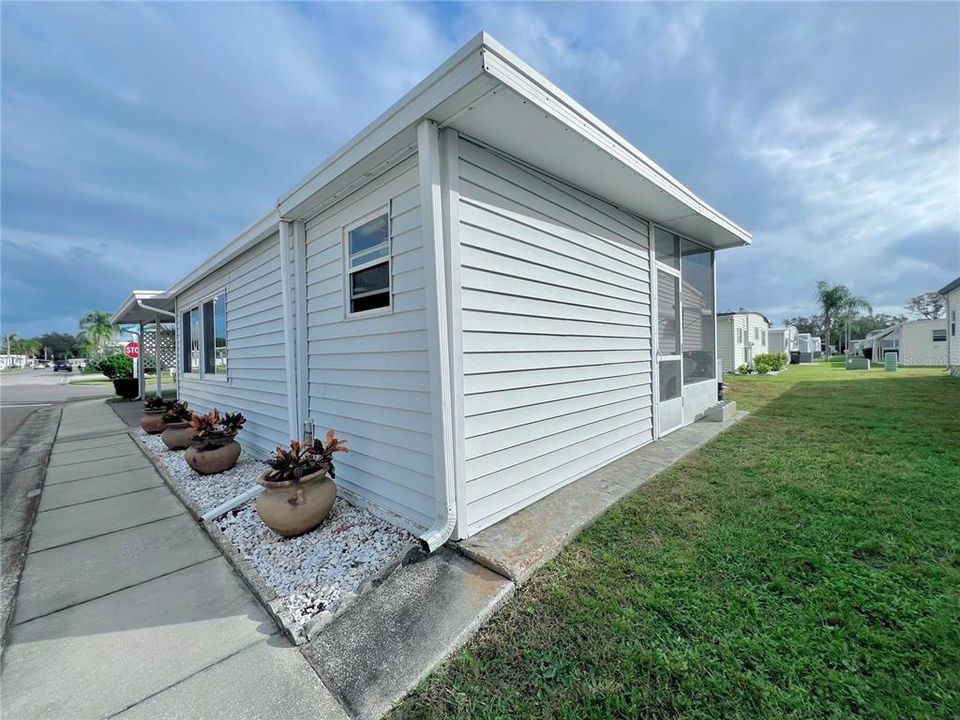 shed and screen room on the northwest corner of the home