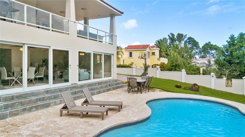 Pool area with lots of backyard space