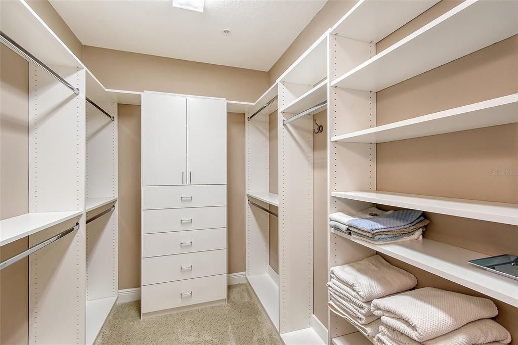 large walk in primary closet