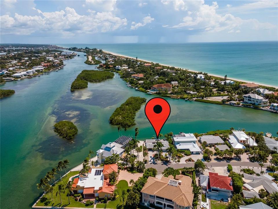 ICW on left, one draw bridge before getting to the Jetty outlet to the Gulf just a short boat ride away. Located just this side of the bridge is the public beach. If you look real close you can see the Jetties just past the bridge about a mile. Home is located on the cove which offers no wakes and minuscule boat traffic.