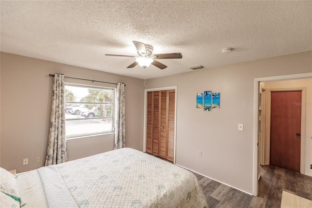 Bedroom with Queen Bed and Ceiling Fan