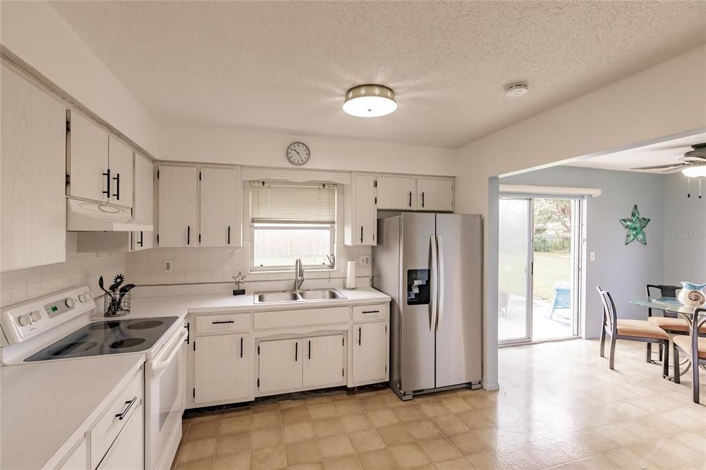 Kitchen and Dining Room with Sliding Doors out to Patio