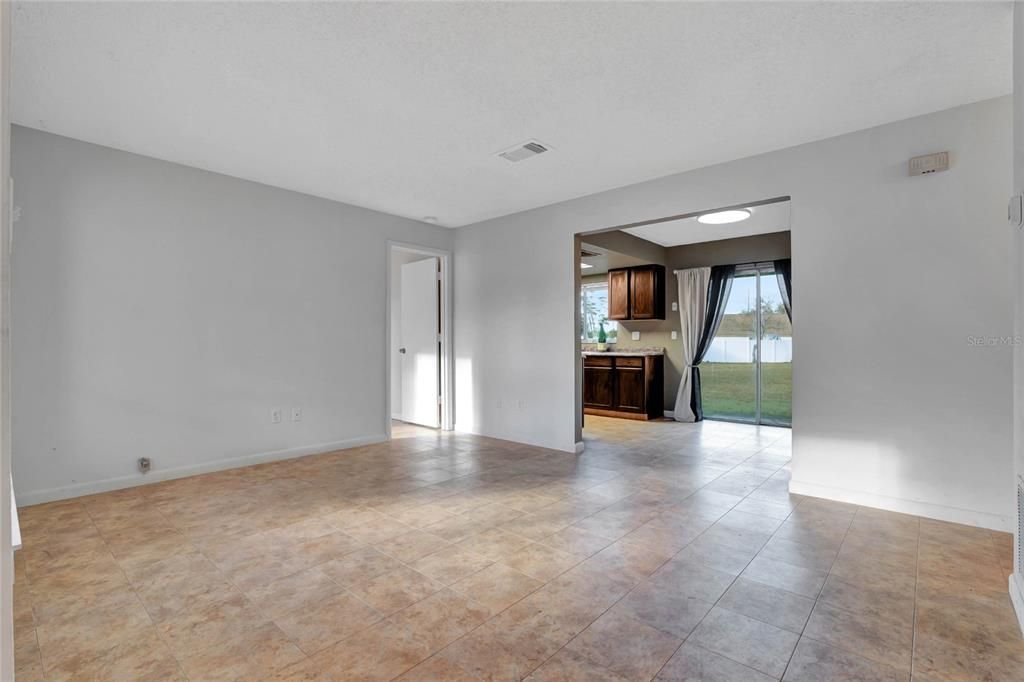 Living Room w/ Door to Primary Bedroom