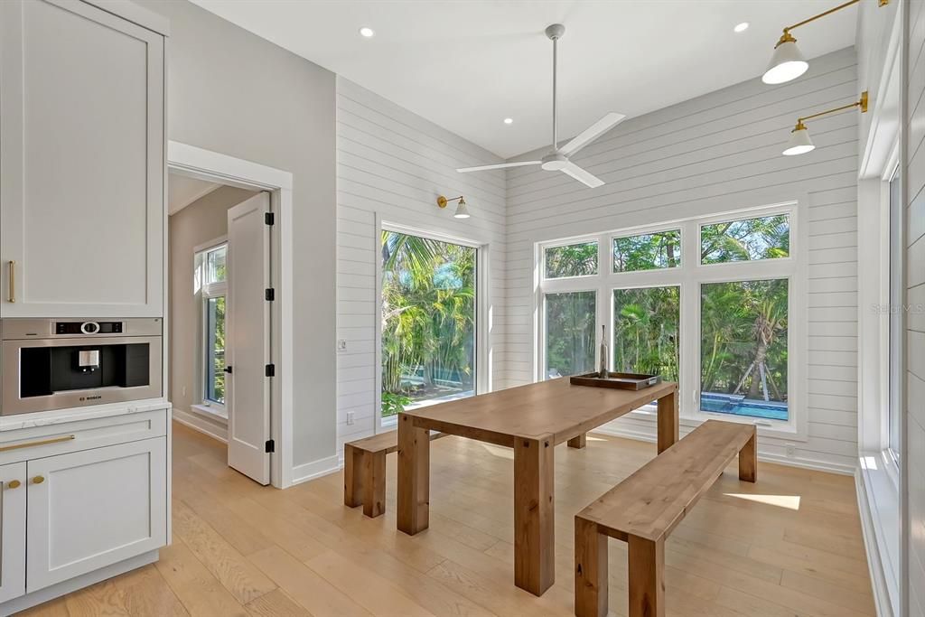 Table was custom built for this area where you can enjoy quiet moments designed for both comfort and style with views of the backyard oasis.