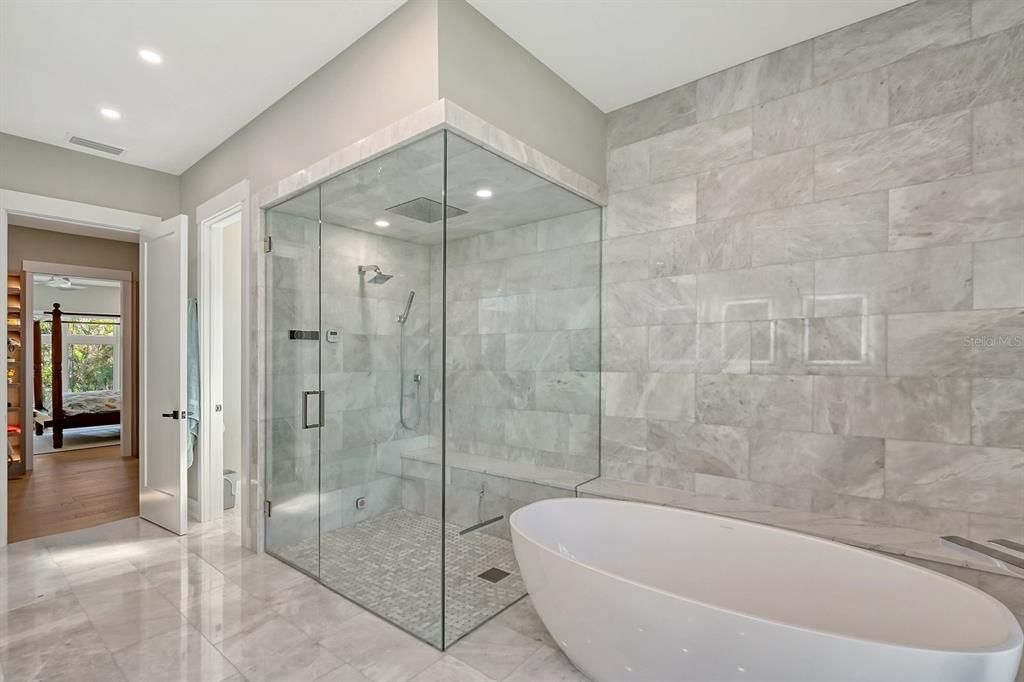 Free standing tub and steam shower make this bathroom a dream.