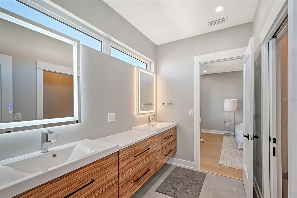 Full bath is shared by two bedrooms.