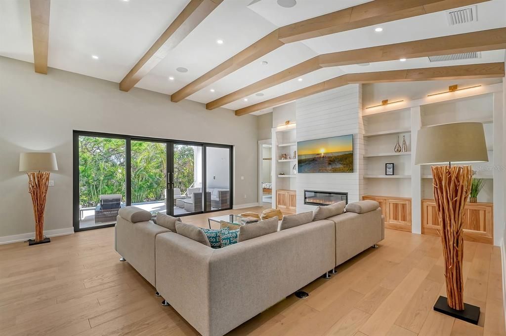 With clean lines and seamless blends, the family room is simply stunning.