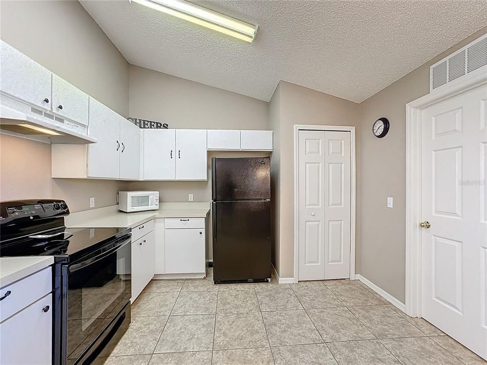 The kitchen has a closet pantry.  The door takes you to the laundry room and out to the garage.