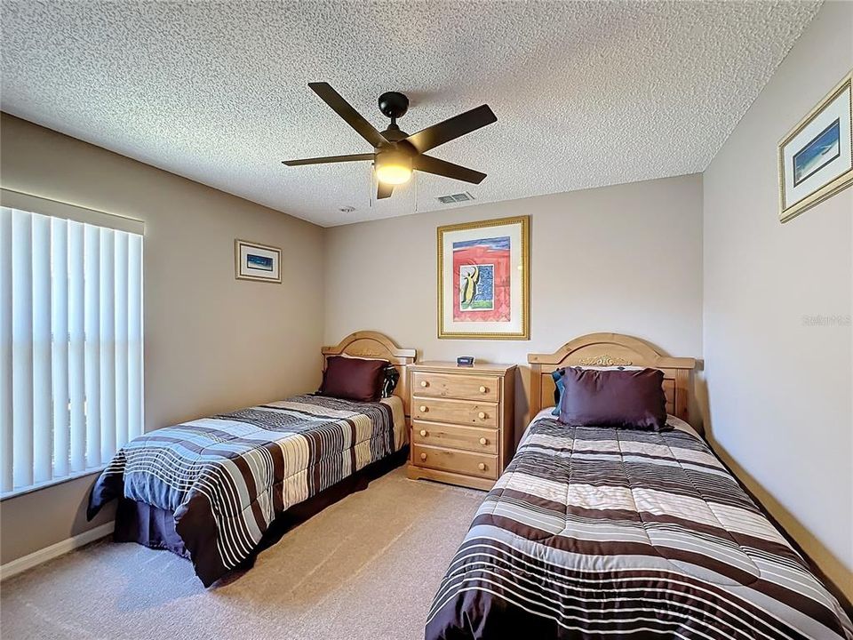 Another view of the guest bedroom with the window facing the west side of the property.