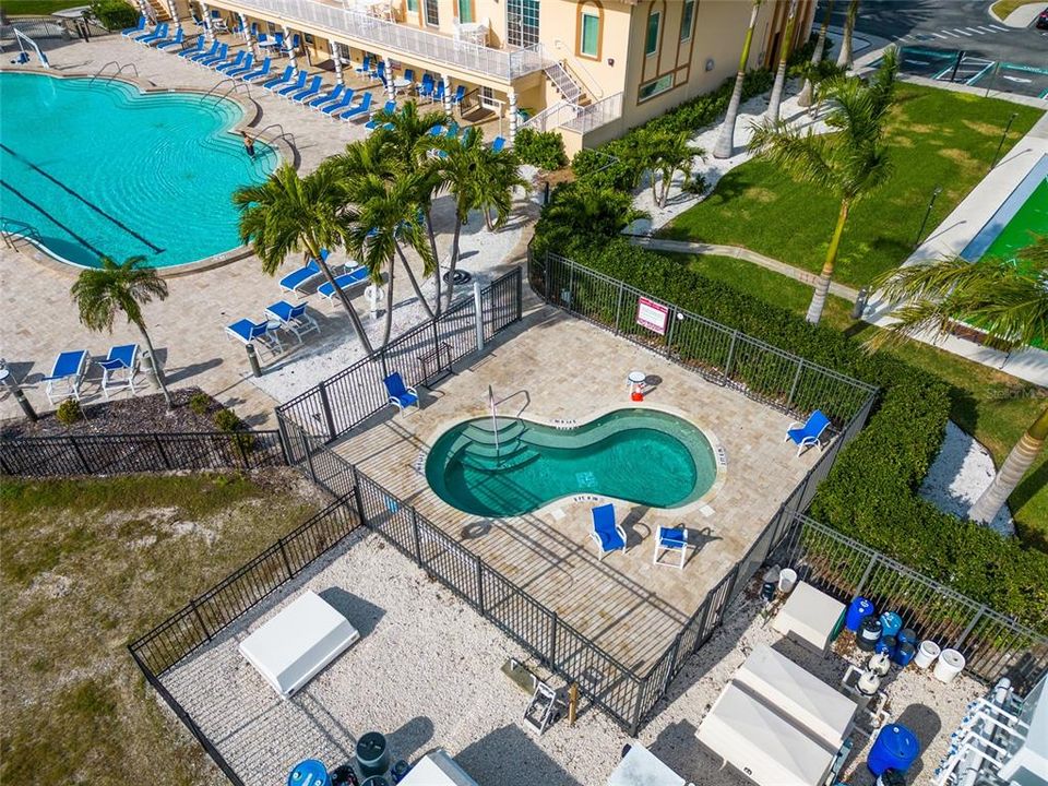 One of 4 community pools alongside one of 2 communities communities.  You can see the corner of the shuffleboard courts on the upper right side of the photo