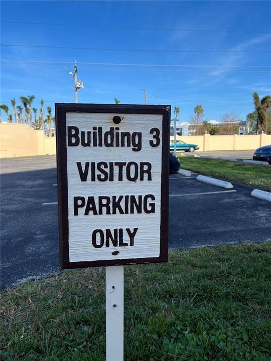 Sign designating the parking lot for visitors for Building 3