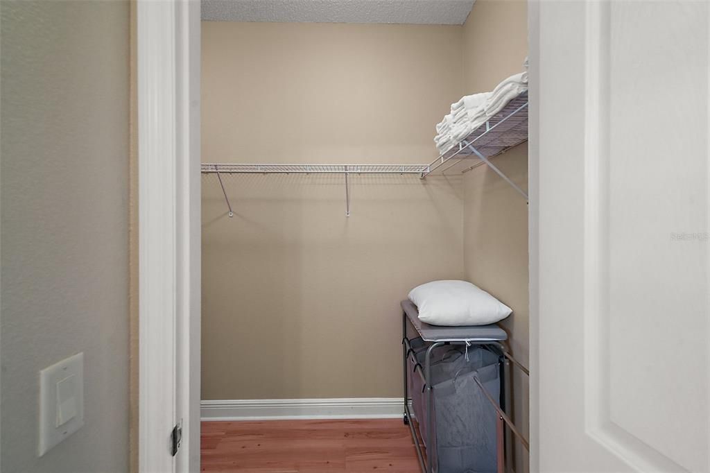 Master bathroom with dual sinks and step down shower