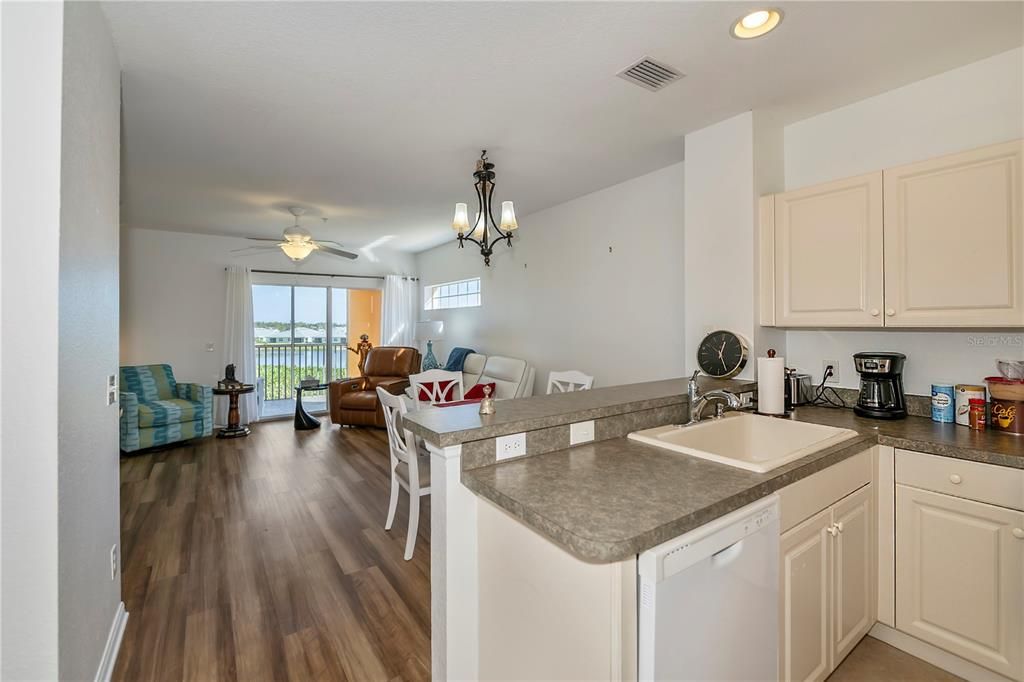 Open floor plan with a private balcony lake view.