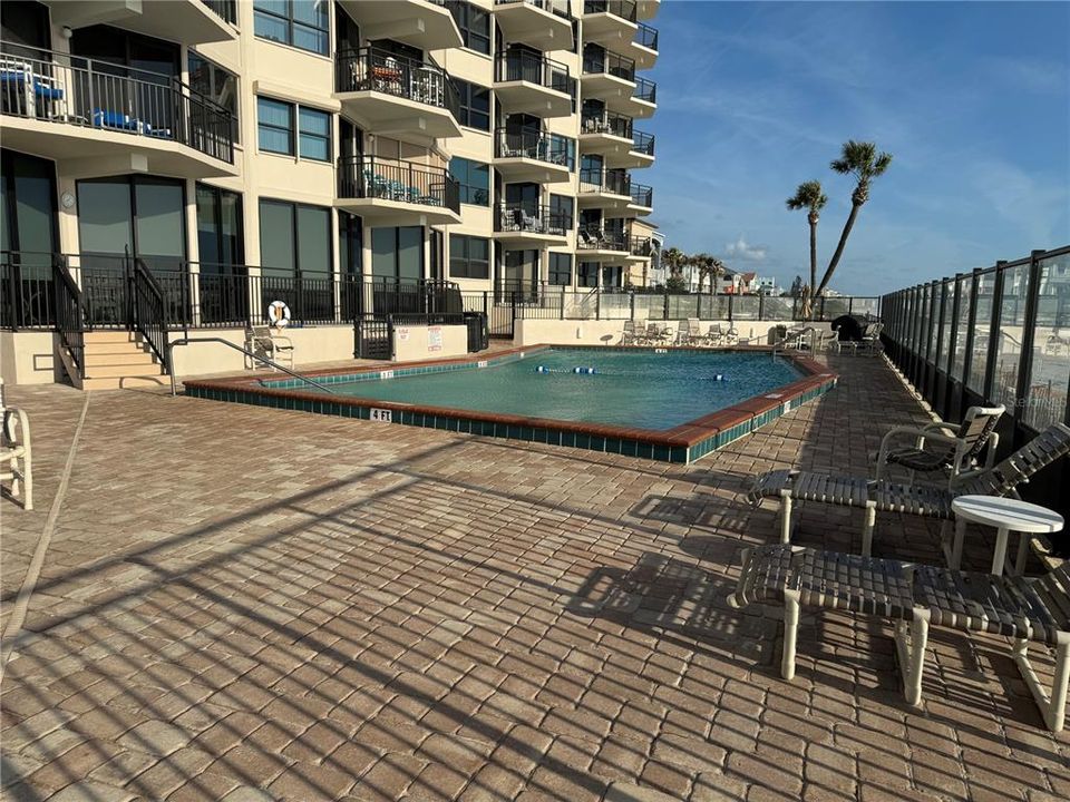 Community Pool with large paver deck