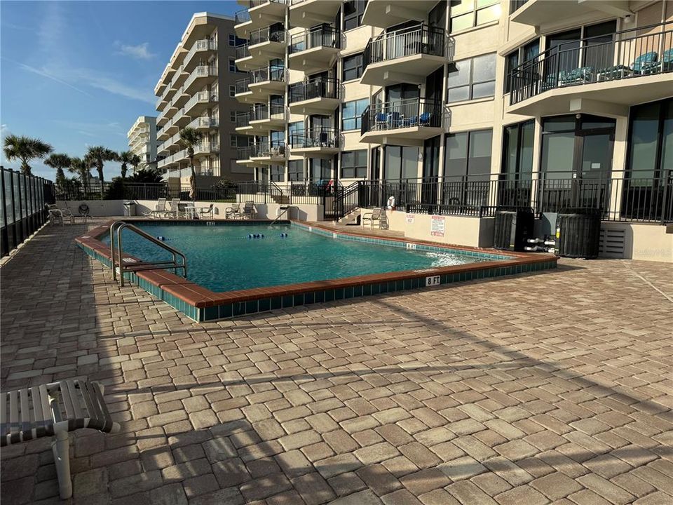 Community Pool with large paver deck