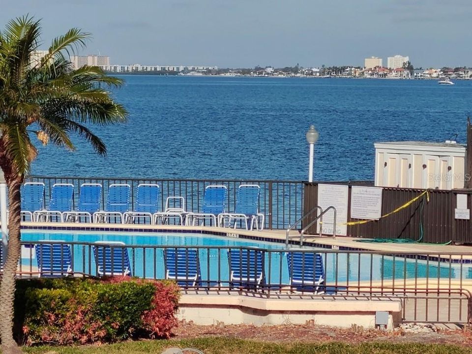 View from Kitchen Window of pool & Boca Ciega Bay