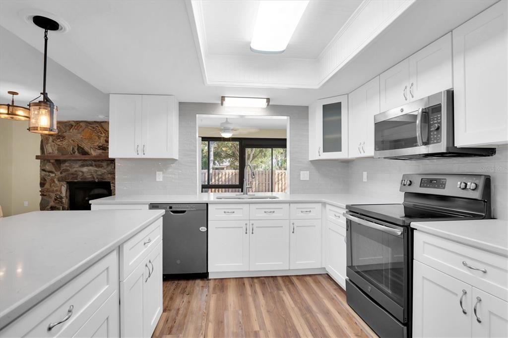 Kitchen with pass through window area to Florida Room